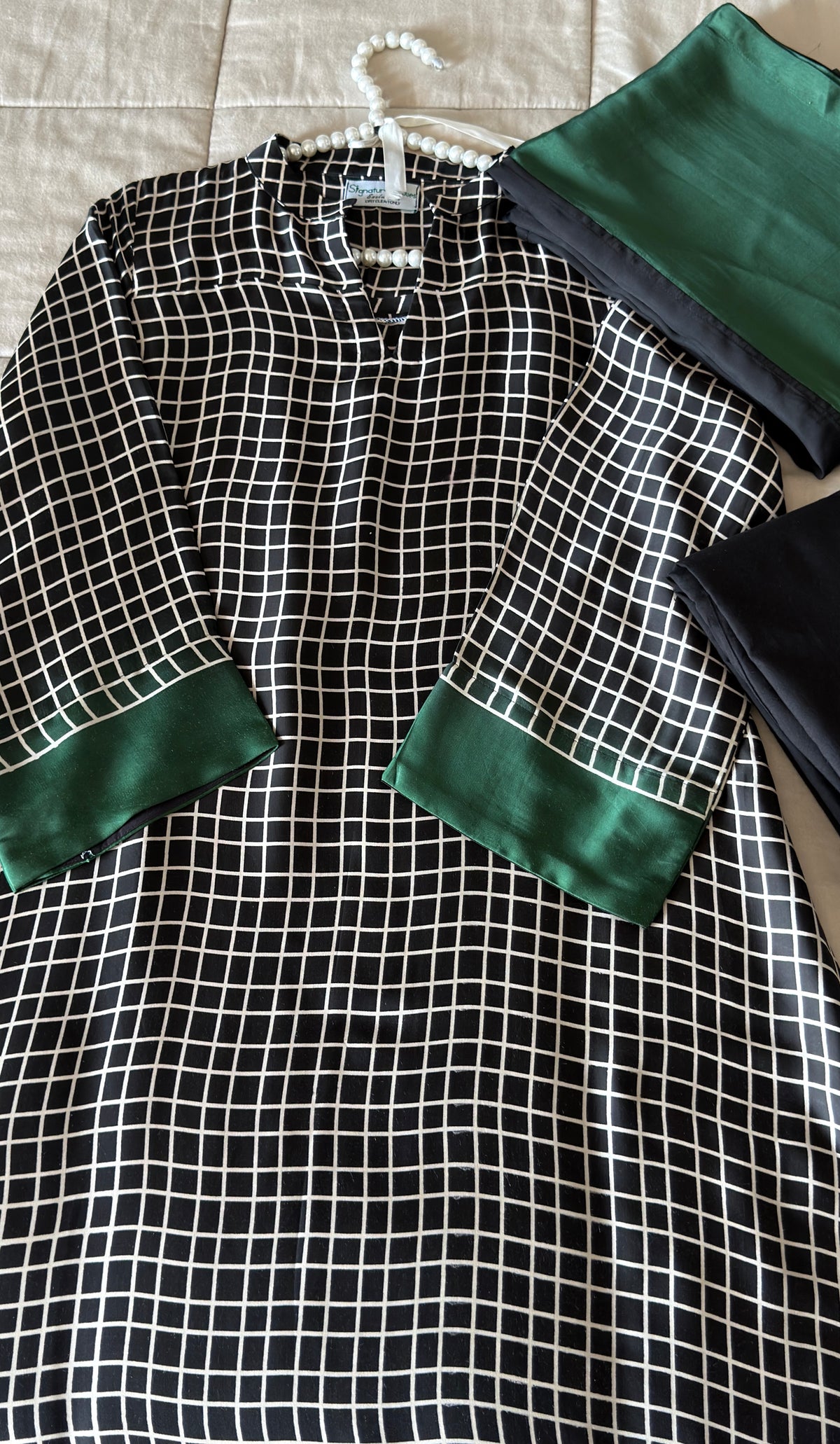 EMERALD CHECKS