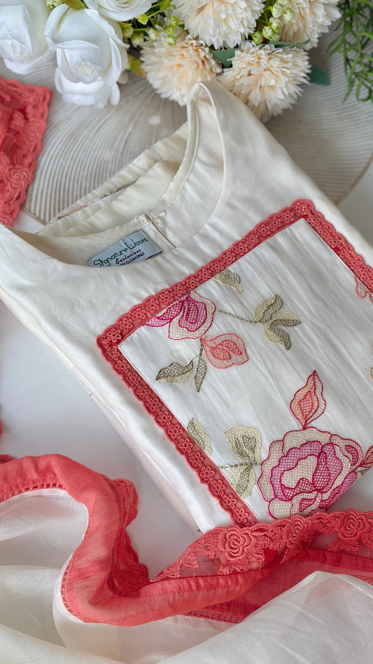 CORAL ON IVORY