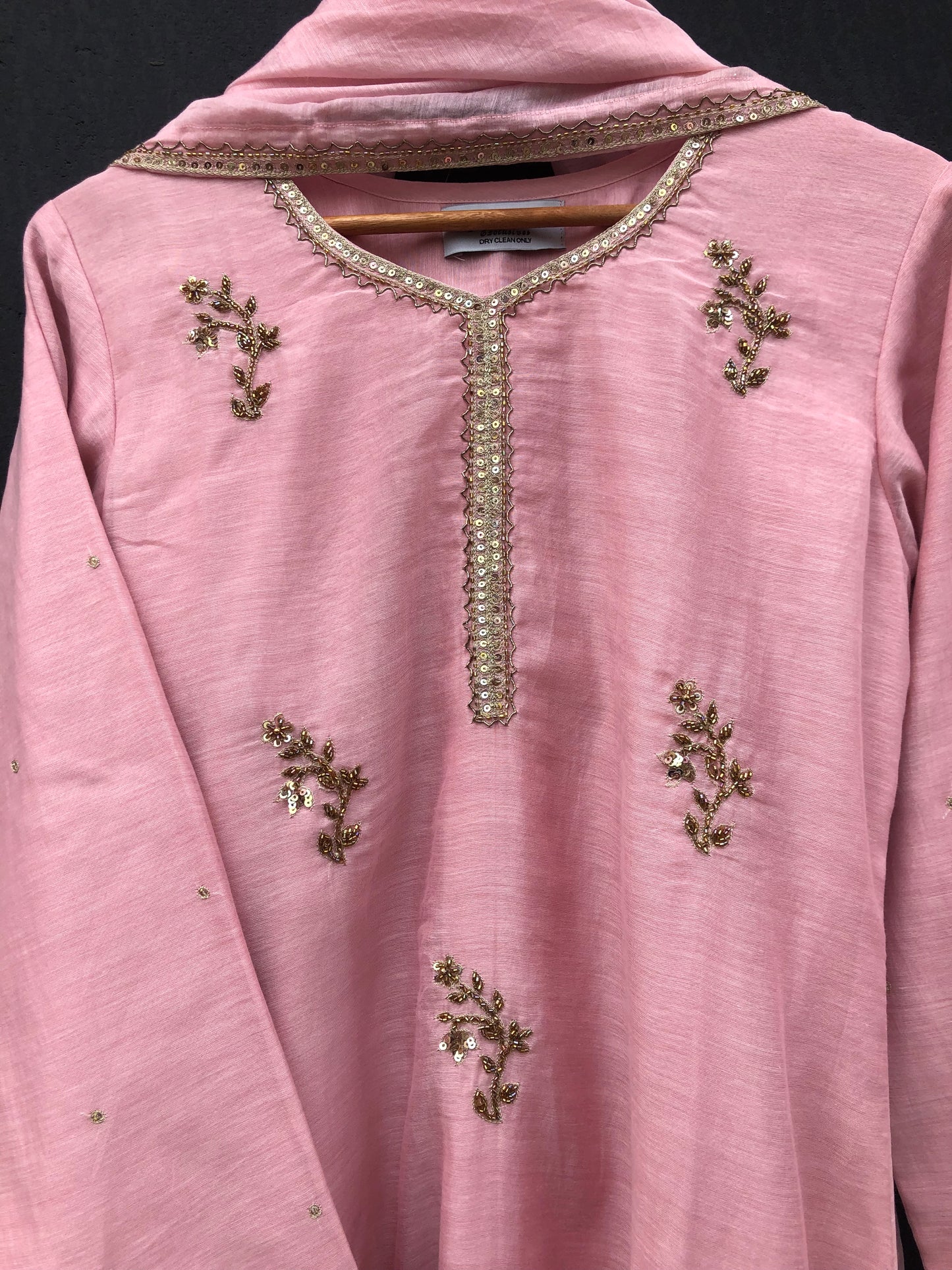 Blush Serenity: Soft Pink Suit with Subtle Shine