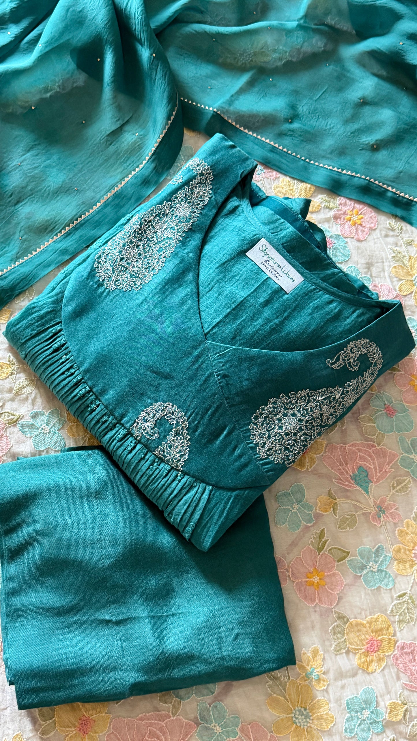 TEAL SAAYA